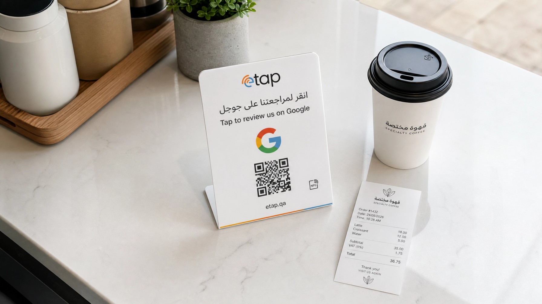 Bilingual NFC Google review stand placed on a cafe counter in Qatar